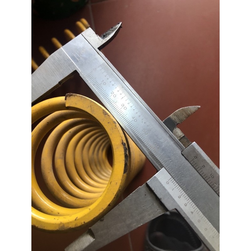 Lò xo nén phi 70mm (sợi 8mm dài 27cm ) ❌❌❌