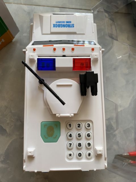 Két sắt mô hình xe cảnh sát tiết kiệm cho bé