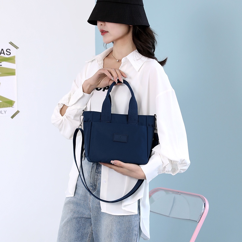 Túi Đeo Chéo Vai Bằng Vải Canvas Nylon Màu Trơn Siêu Nhẹ Kiểu Dáng Đơn Giản Dành Cho Nữ