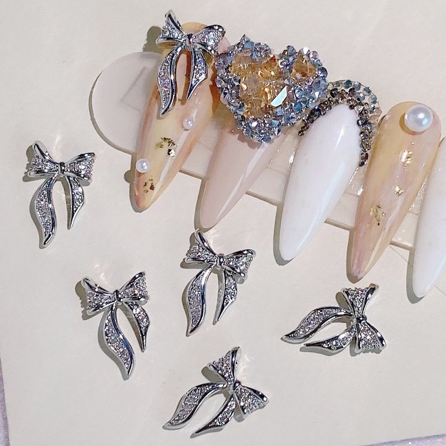 Charm nơ kim loại giá rẻ loại sáng đẹp
