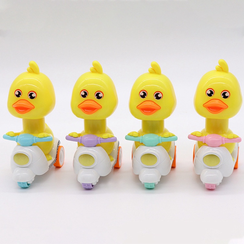 Đồ Chơi Chú Vịt Vàng Hoạt Hình Lái Xe Máy Dễ Thương Cho Bé