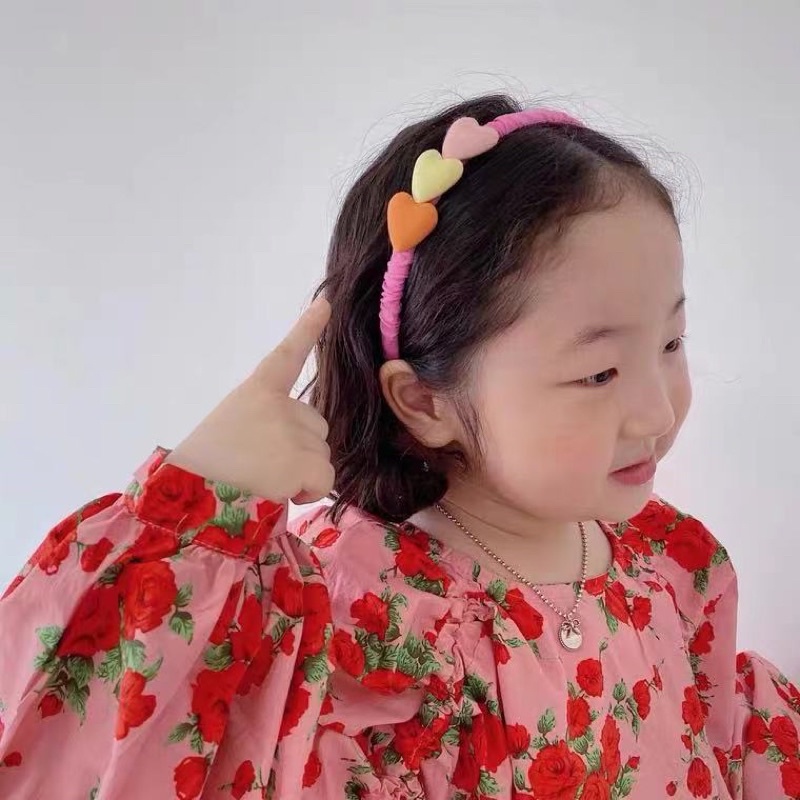 Bờm vải nhún trái tim cho bé gái