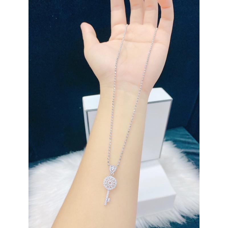 Dây chuyền bi mặt chìa khoá mạ bạch kim