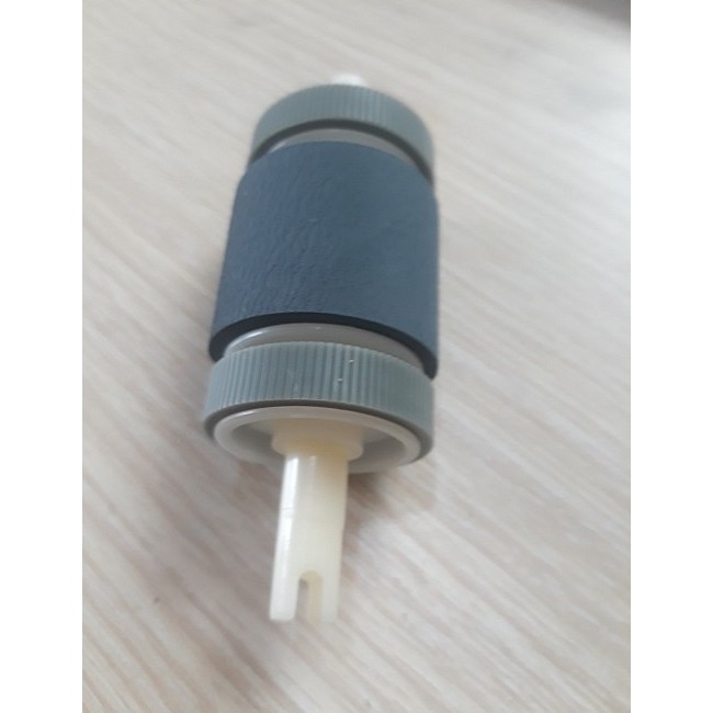 Bánh xe kéo giấy có 2 bánh phụ 49a, Canon 3300, HP 1160, 1320, 2014, 2015, 308 khay dưới lớn. Quả đào cuốn giấy máy in