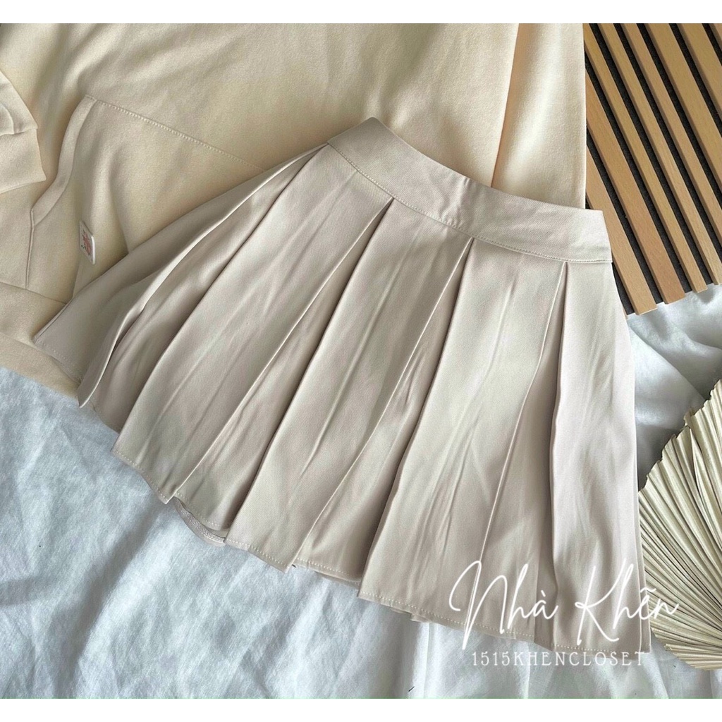 Set áo tay dài cổ polo sweater chân váy xếp li màu be
