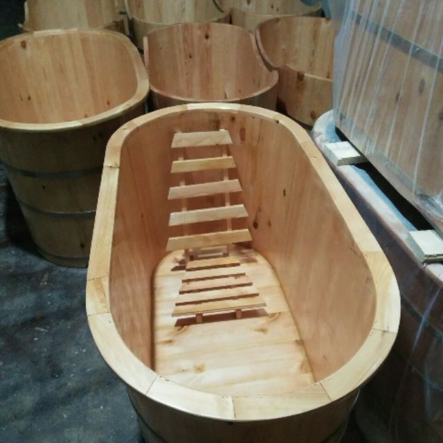Bồn tắm gỗ oval bo viền
