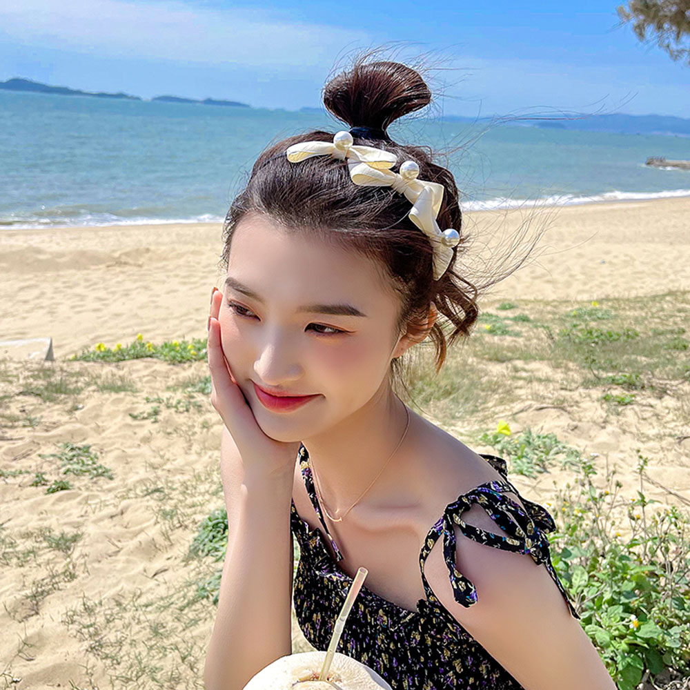 Băng đô vải thắt nơ đính ngọc trai nhân tạo