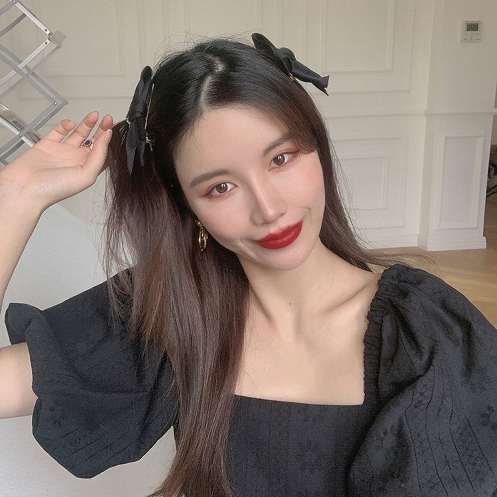 Kẹp tóc nơ đôi phối tua rua màu trơn phong cách Hàn Quốc dễ thương cho nữ