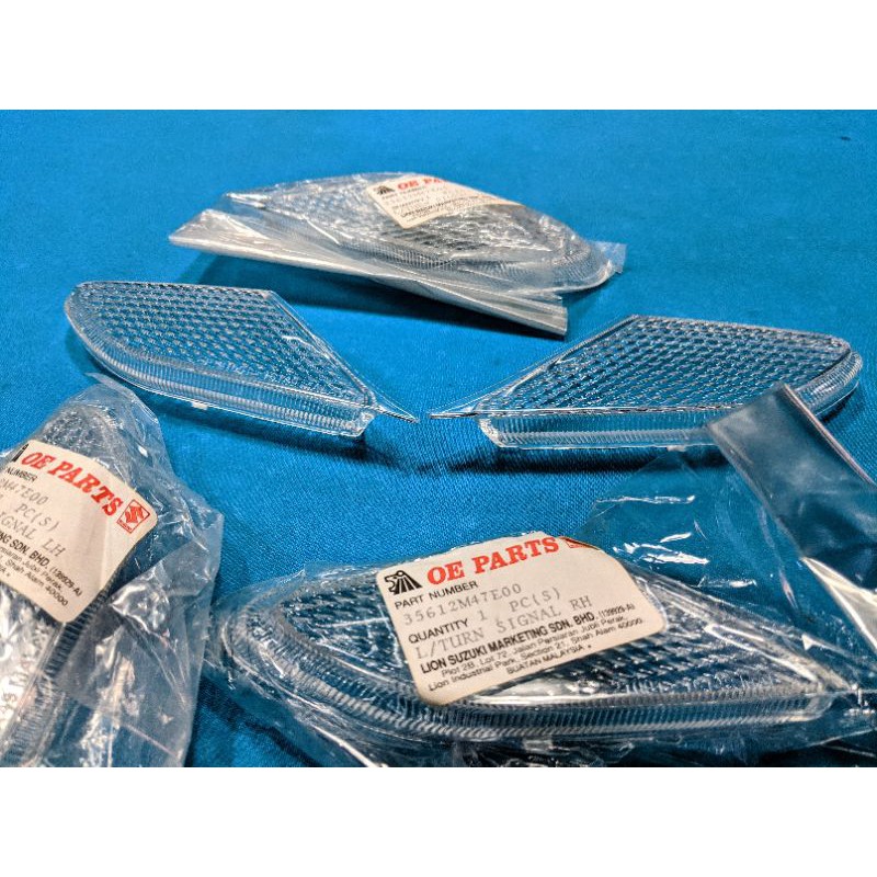 Chụp đèn xinhan trước Suzuki FX 125 chính hãng