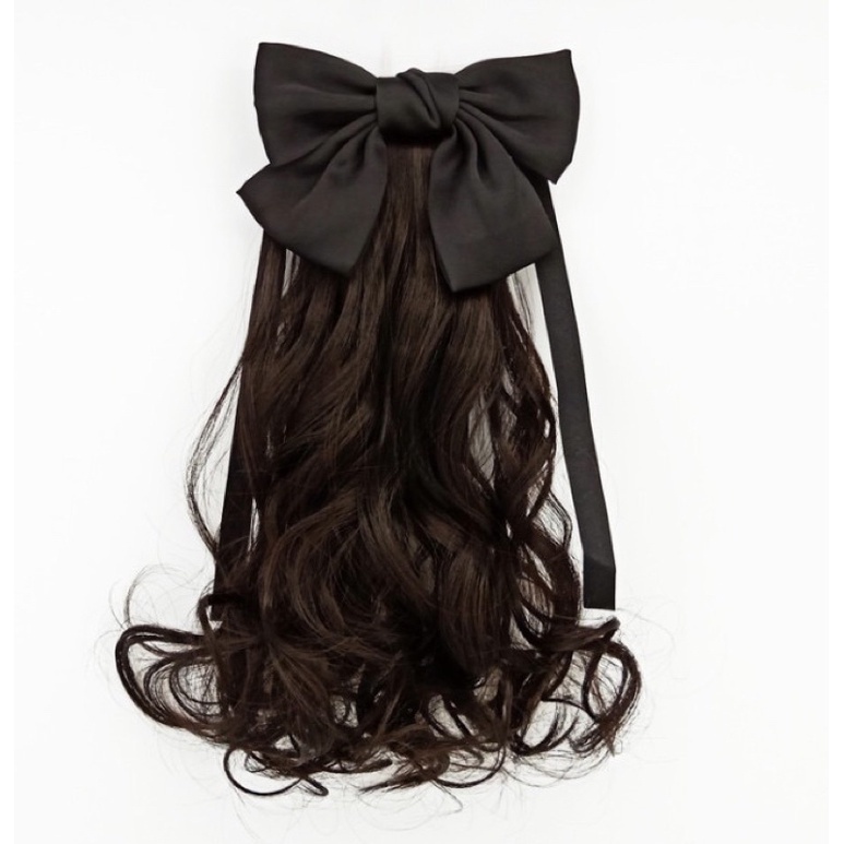 Tóc cột xoăn kèm nơ cho bé