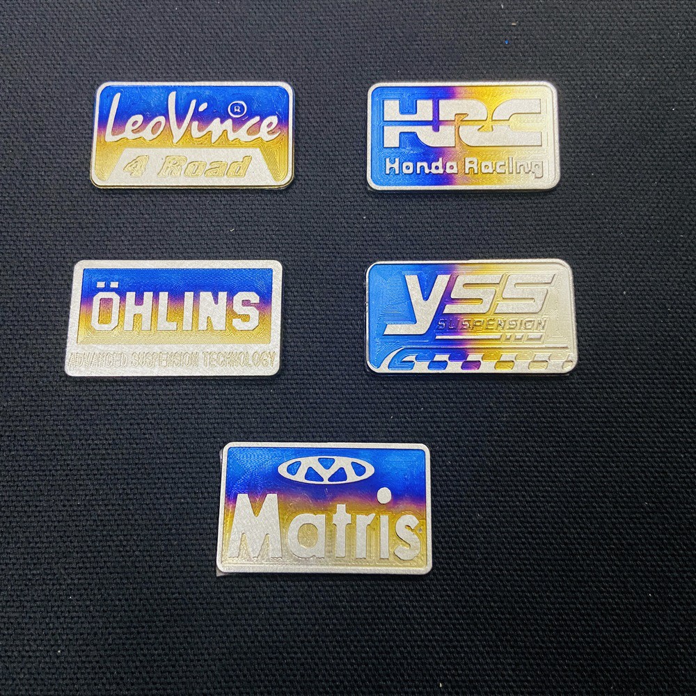Tổng hợp tem logo Titan dán cóc phuộc các loại xe máy Leo Vince, Ohlins, HRC, YSS, Matris