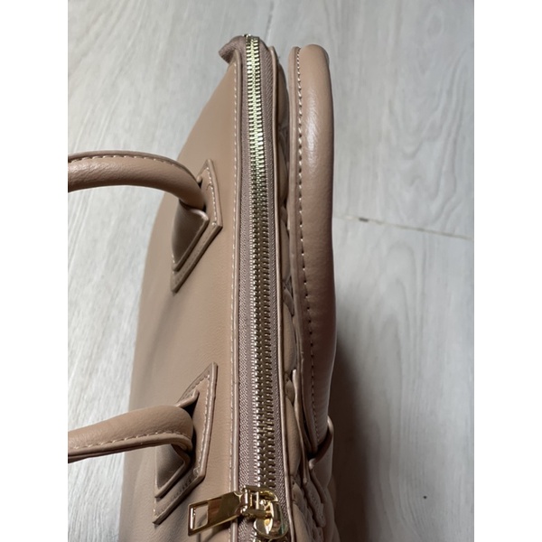 Túi cầm tay đeo chéo siz22cm.6 ô li,4 màu chọn lựa.Freeshipetra.