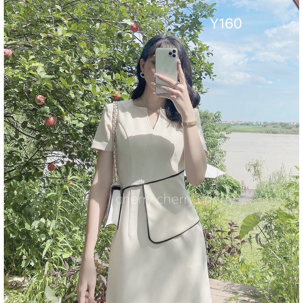 Váy văn phòng cổ V vạt eo tôn giáng tự tin