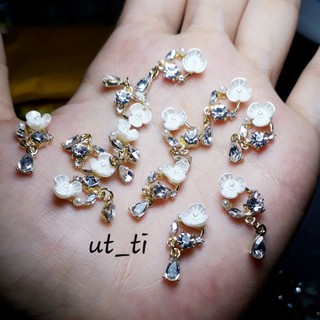 đá hình nail.cụm hoa có lắc vàng mã 17