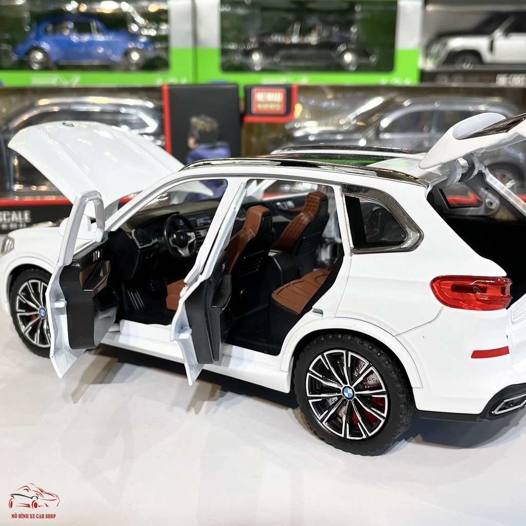 Mô hình xe ô tô hợp kim BMW X5 Driver tỉ lệ 1:24 đánh lái, bấm còi hãng Newao 3 màu