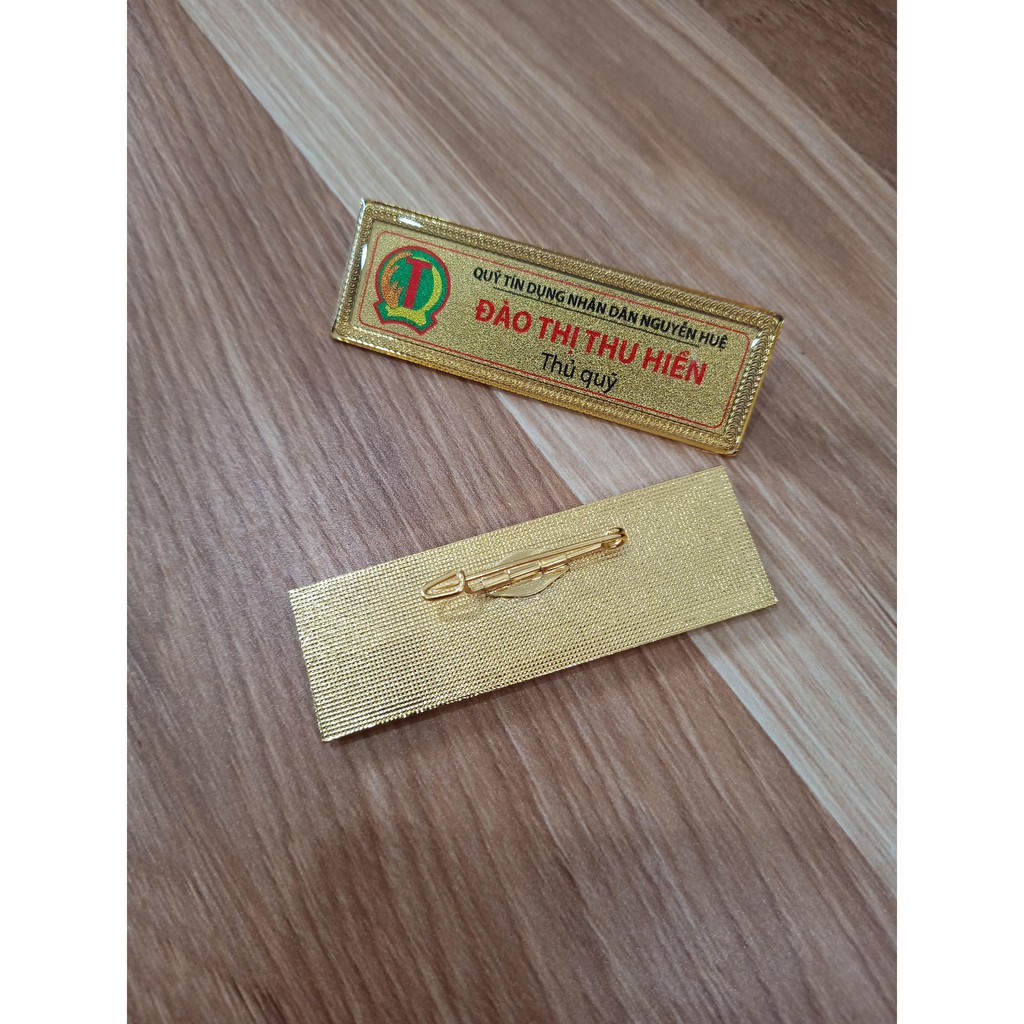 Thẻ tên cài áo phôi đồng mạ vàng, name tag