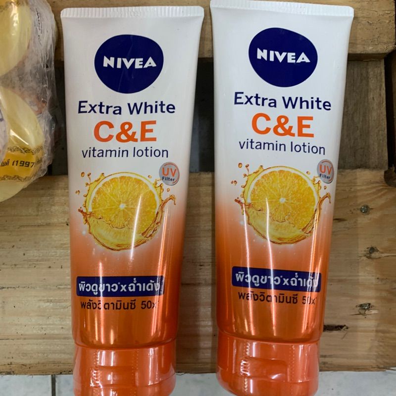 Dưỡng Thể Chống Nắng trắng da NIVEA 100X EXTRA WHITE C &amp; A Thái Lan 180ml