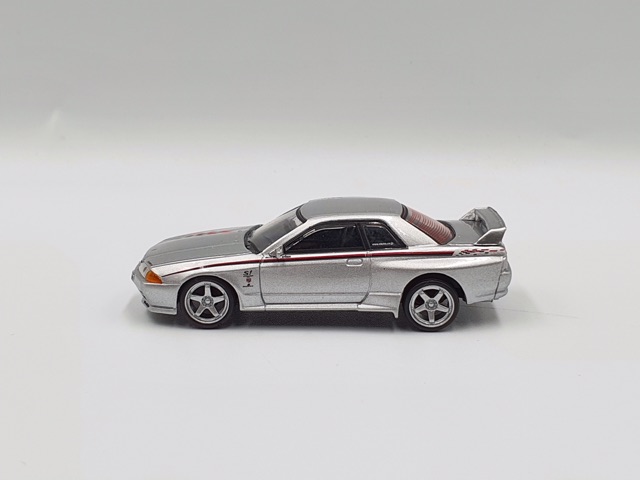 Xe Mô Hình Nissan Skyline GT-R 1:64 MiniGT ( Bạc )