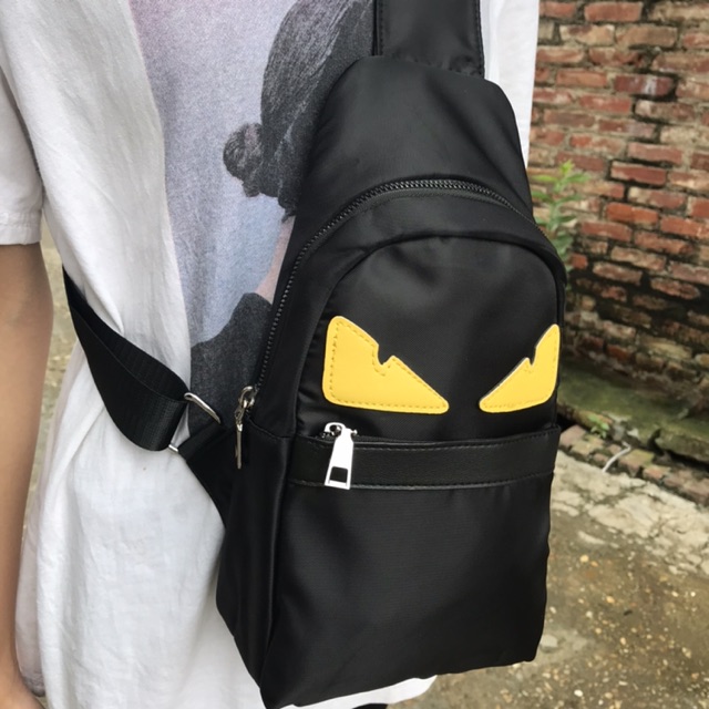 Túi đeo chéo mắt vàng | BigBuy360 - bigbuy360.vn