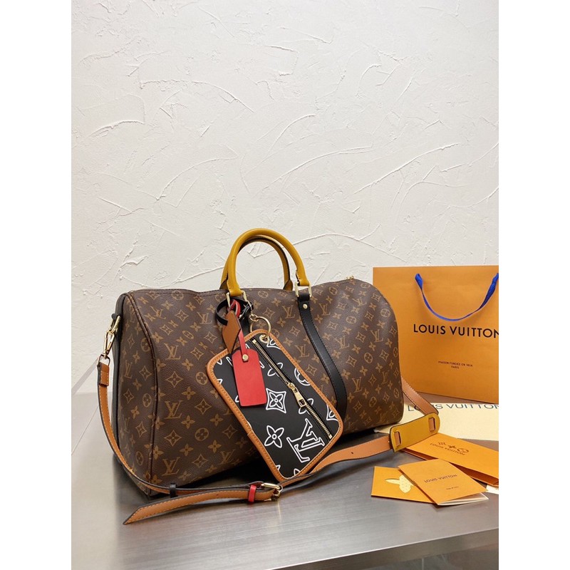 Túi xách du lịch thời trang kèm túi kéo khoá mini da thật cao cấp Louis Vuitton LV