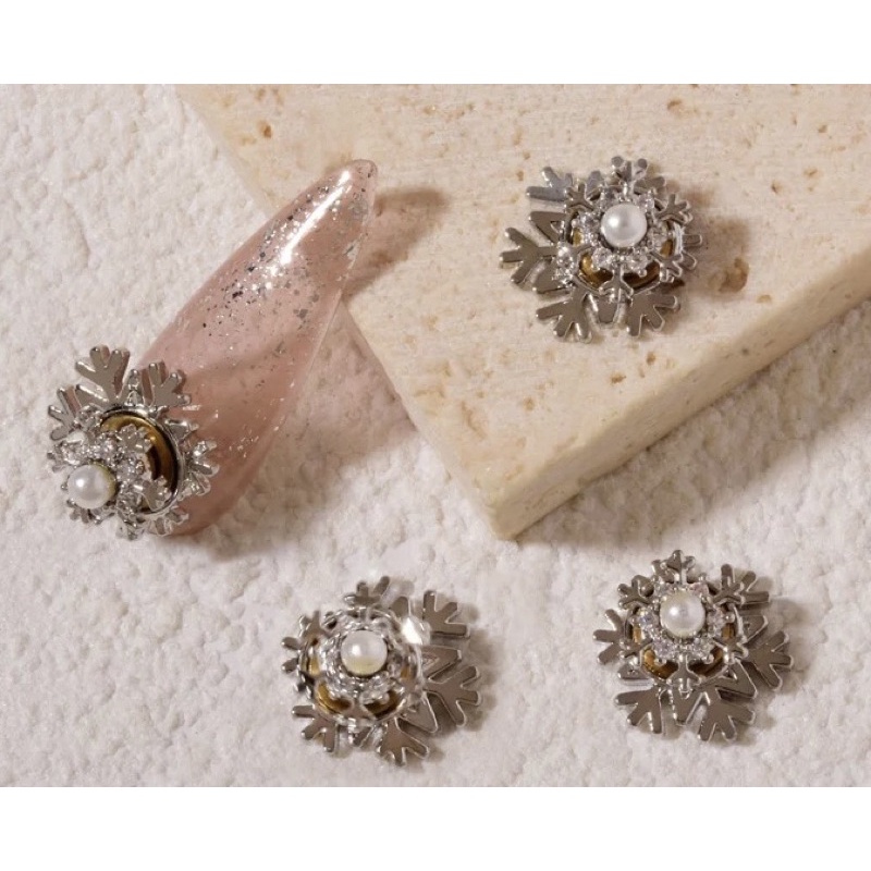 Charm xoay hình bông tuyết