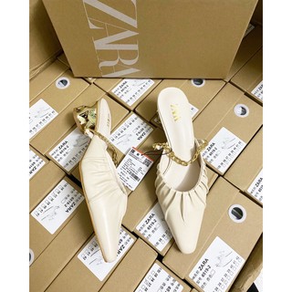 Sục Zara. quai xích