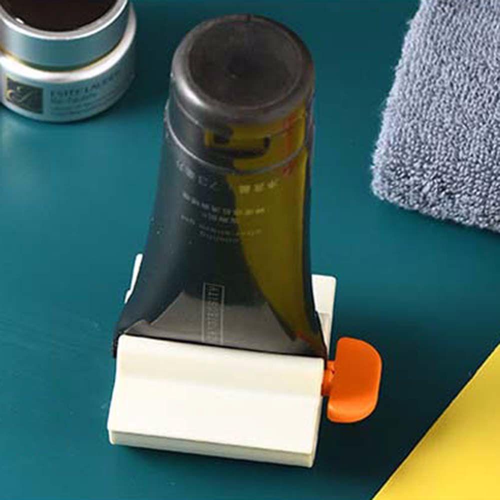 Dụng Cụ Nặn Kem Đánh Răng Bằng Nhựa Dạng Ấn Tiện Dụng