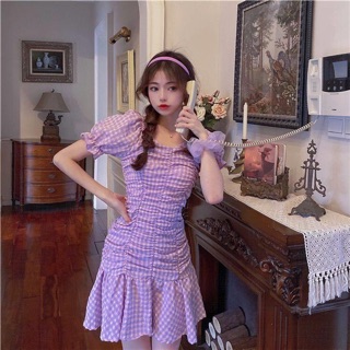Đầm caro tím đuôi cá