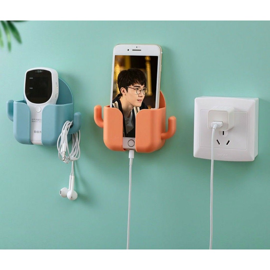 Kệ Đựng Remote Để Điện Thoại Dán Tường Có Khe Luồn Dây Sạc Tiện Lợi