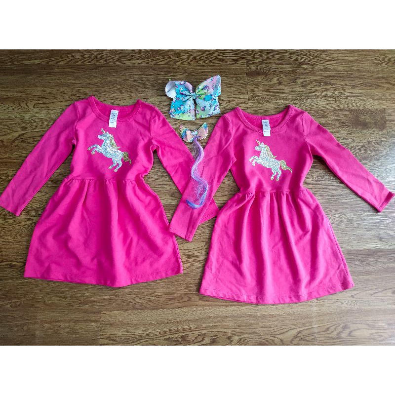 Đầm xuất hồng ngựa poly xinh xắn cho bé gái .