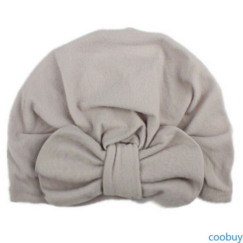 Mũ trùm đầu đính nơ đáng yêu cho bé