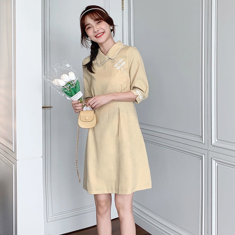 2022 Spring and Autumn New Cheongsam improved version of the small doll collar medium-long dress temperament waist shows a thin woman