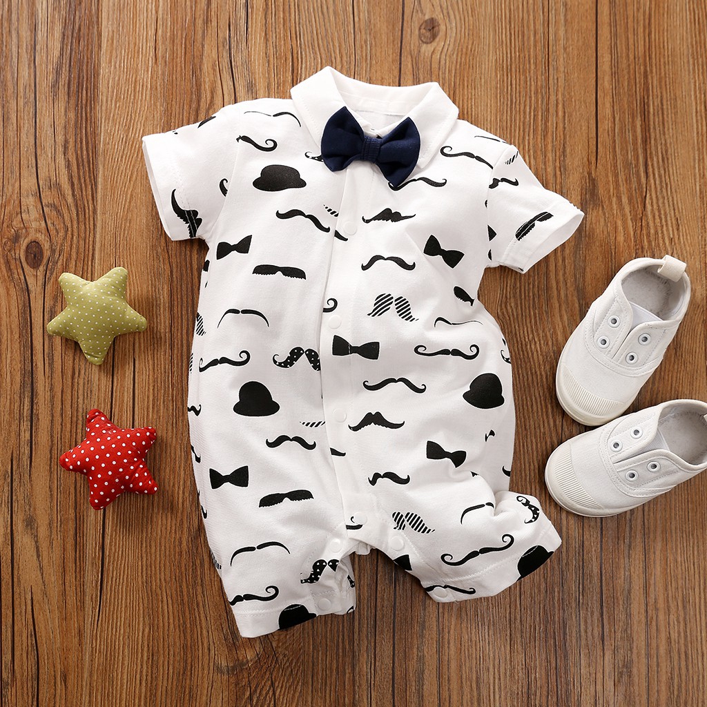 Bé trai tay ngắn nơ nam jumpsuit