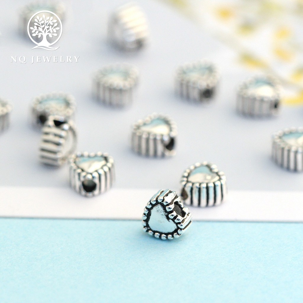 Charm bạc trái tim xỏ ngang - NQ Jewelry