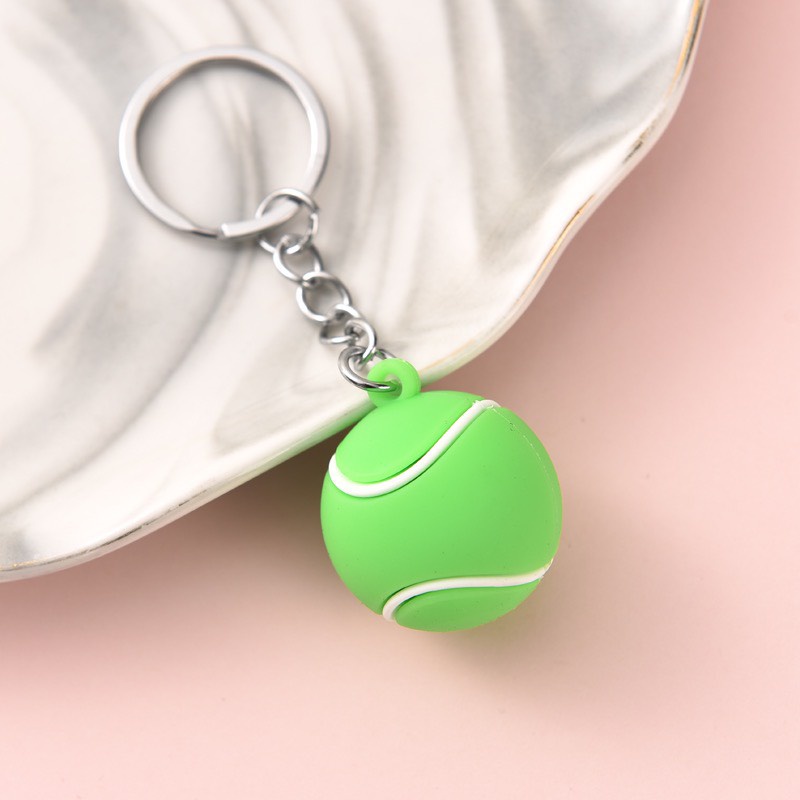 Móc khoá 4 loại bóng bao gồm bóng đá , bóng tenis , bóng rổ và bóng bầu dục