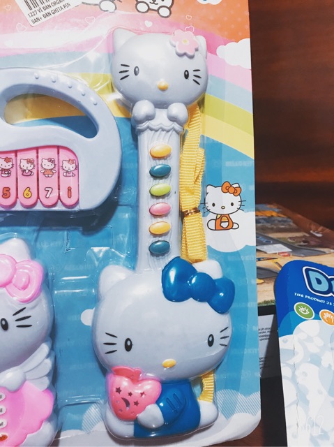 Đồ chơi đàn đoremon, mèo kitty 3 chạy pin, phát nhạc