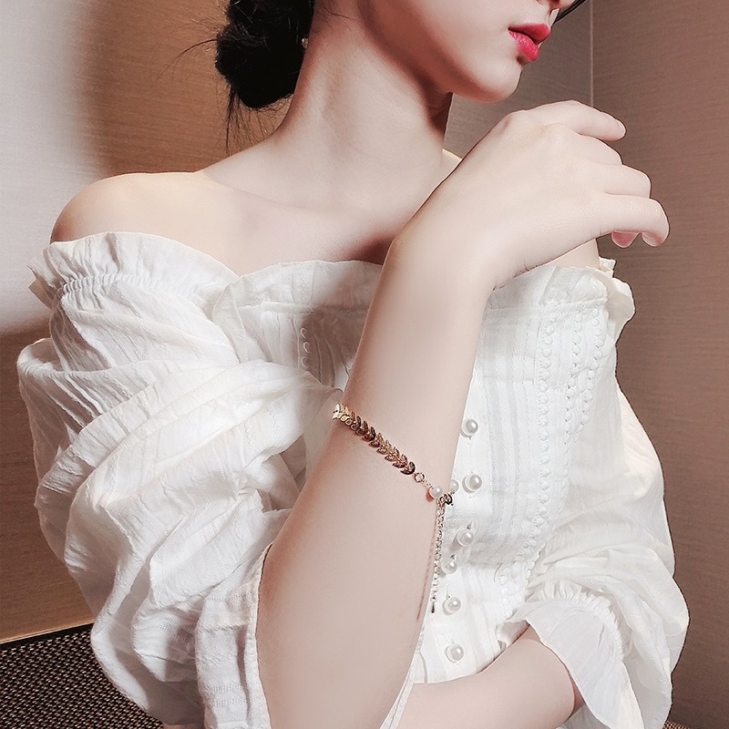 Vòng Đeo Tay Chuỗi Hạt Ngọc Trai Hình Chiếc Lá Thời Trang Cho Nữ