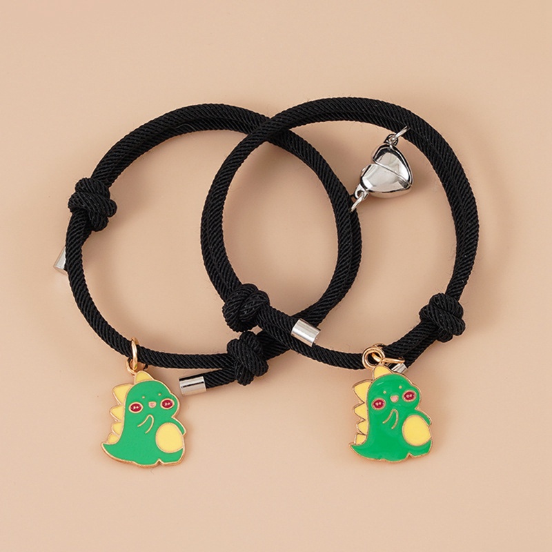 Set 2 vòng tay màu đen phối mặt hình khủng long có nam châm hình trái tim thời trang cho cặp đôi