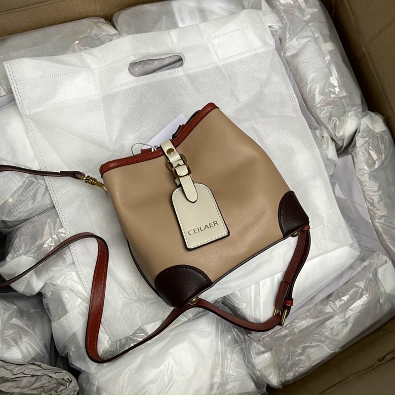 TNS - Túi bucket đeo chéo rút dây hottrend Ceilar-chất da cao cấp-tone nâu phối kem rất tây