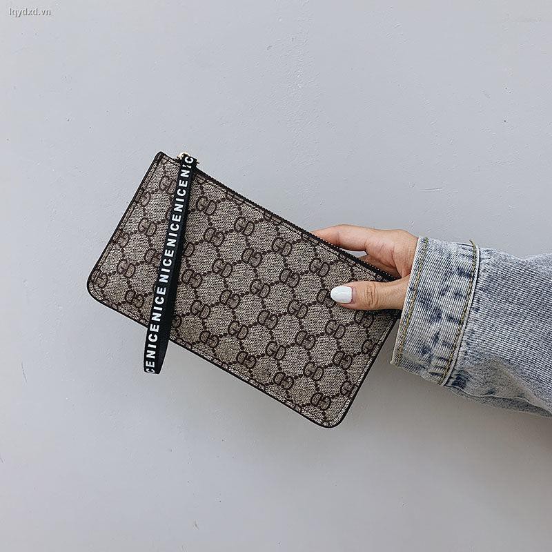 New 7-inch large mobile phone bag, European and American women s clutch female wallet, long zipper, capacity, ultra-thin wrist bag