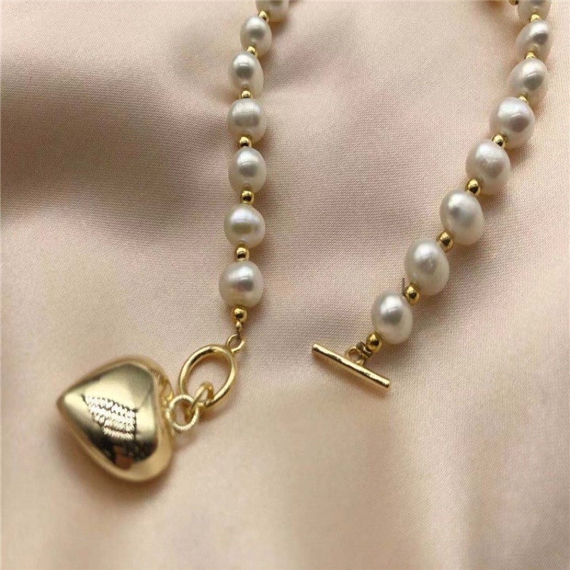 Vòng tay 7ly mix charm trái tim - NT35 - Ngọc Trai Trường Thịnh