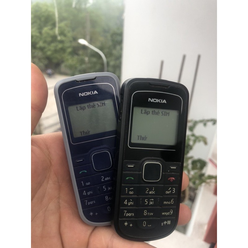 Th?t ĐIỆN THOẠI NOKIA 1202 CHÍNH HÃNG ( CŨ 99% ) cam kết máy zin + sạc