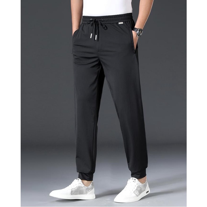 Quần nỉ nam,quần thể thao nam 4 màu vải poly co giãn