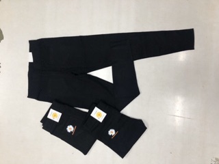 Quần legging in hoa cúc vàng