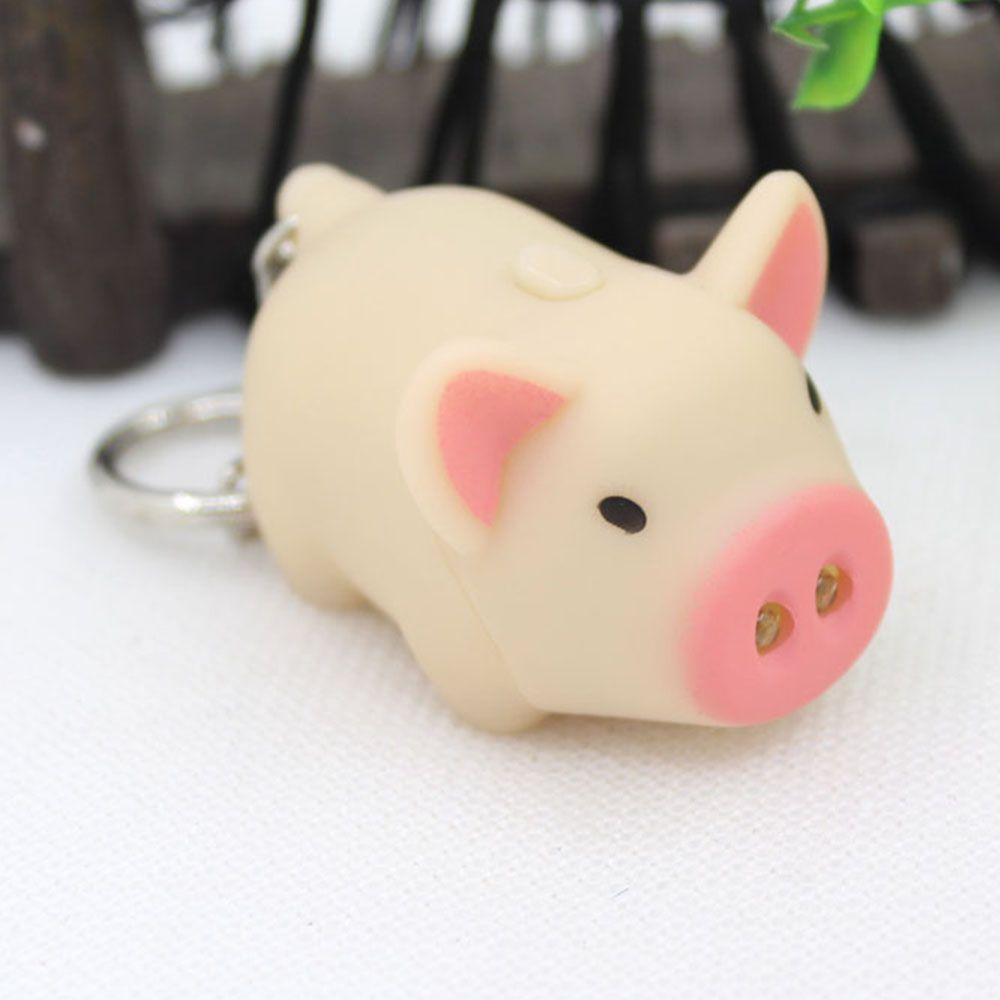 Móc Khóa Hình Heo Con Có Đèn LED Dễ Thương Giá Đỡ