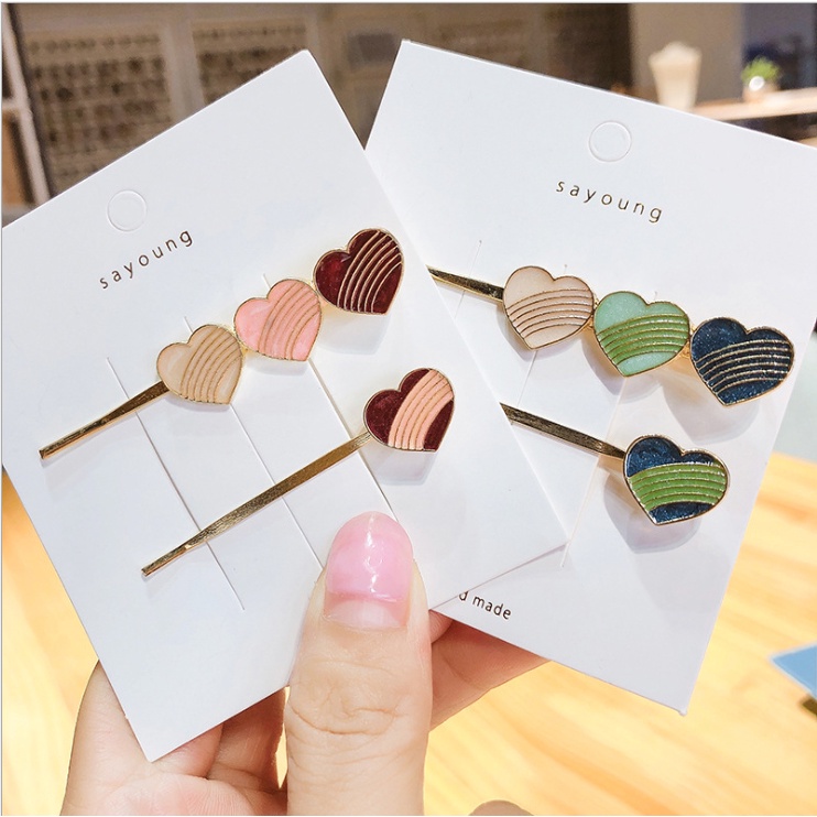 Set 2 kẹp tóc trái tim KAH108