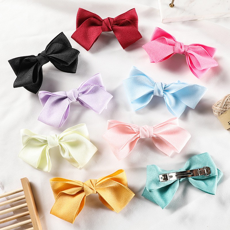 Kẹp nơ vải cát nhiều màu K116
