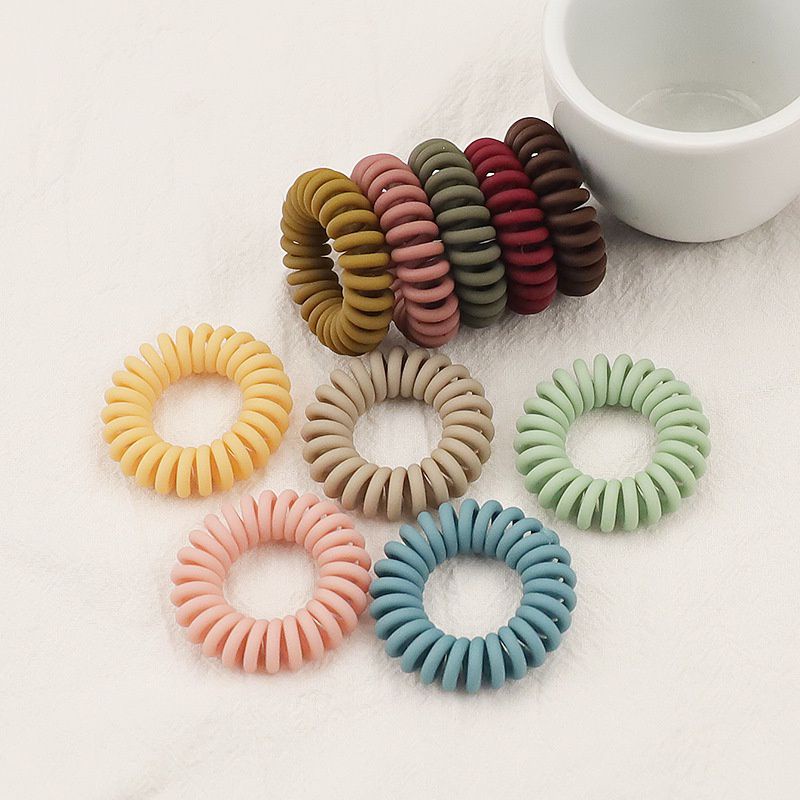 Dây cột tóc lò xo nhám, màu pastel xinh xắn cho nữ