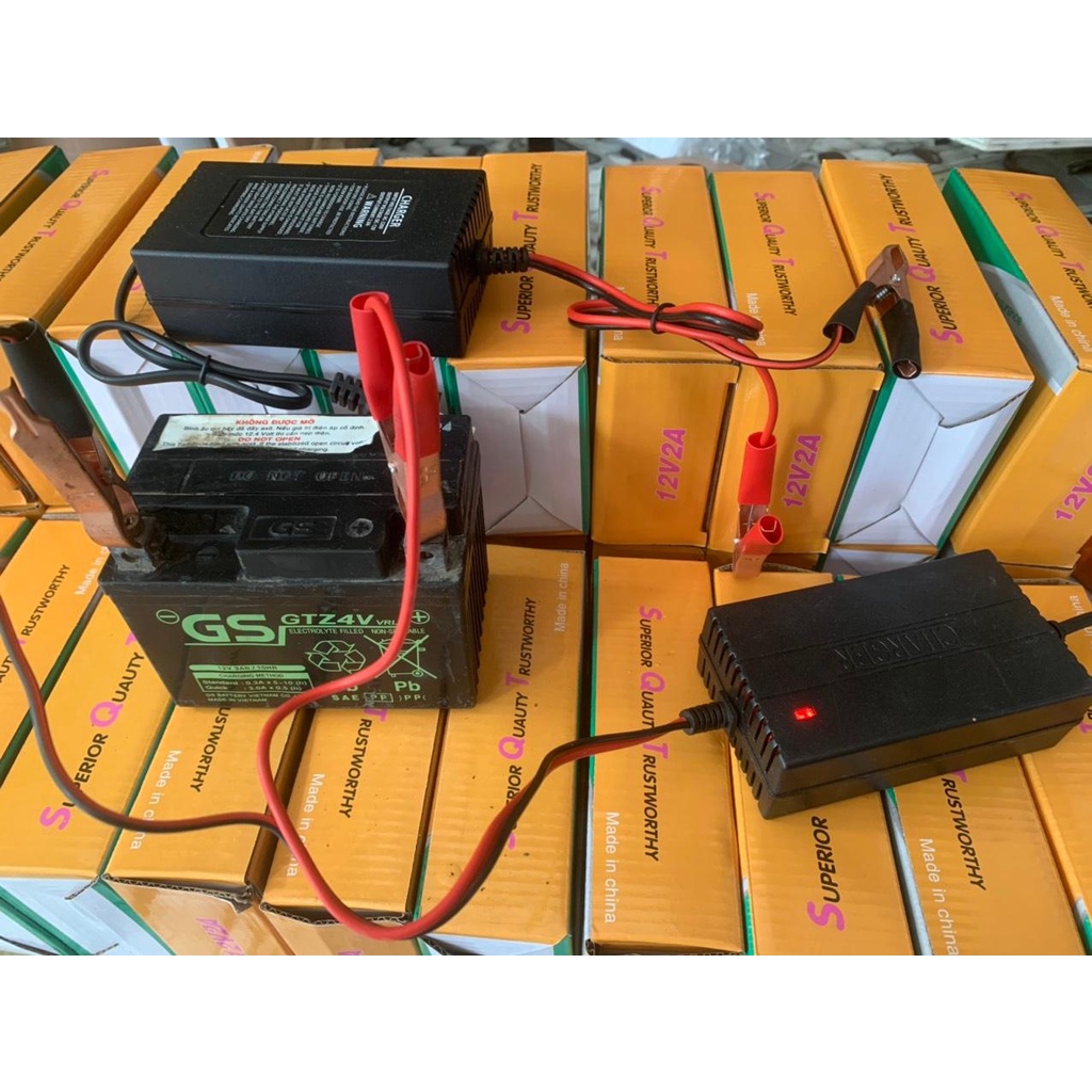 Sạc bình ăc quy axit khô nước 12V2Ah cho xe máy tự ngắt khi đầy sạc cho bình dl từ 4ah -20ah chống chập chống ngược cực.