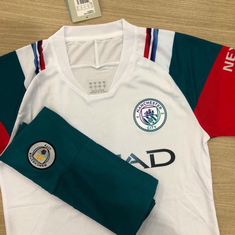Bộ Đồ Đá Bóng Manchester City (Man city) Trắng Tay Đỏ Vải Gai Thái Hàng Cao Cấp - Quần Áo Bóng Đá PP Bởi Be Happy Sport